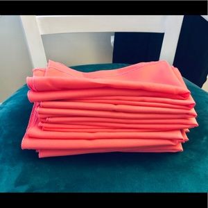 Set of coral cloth napkins.